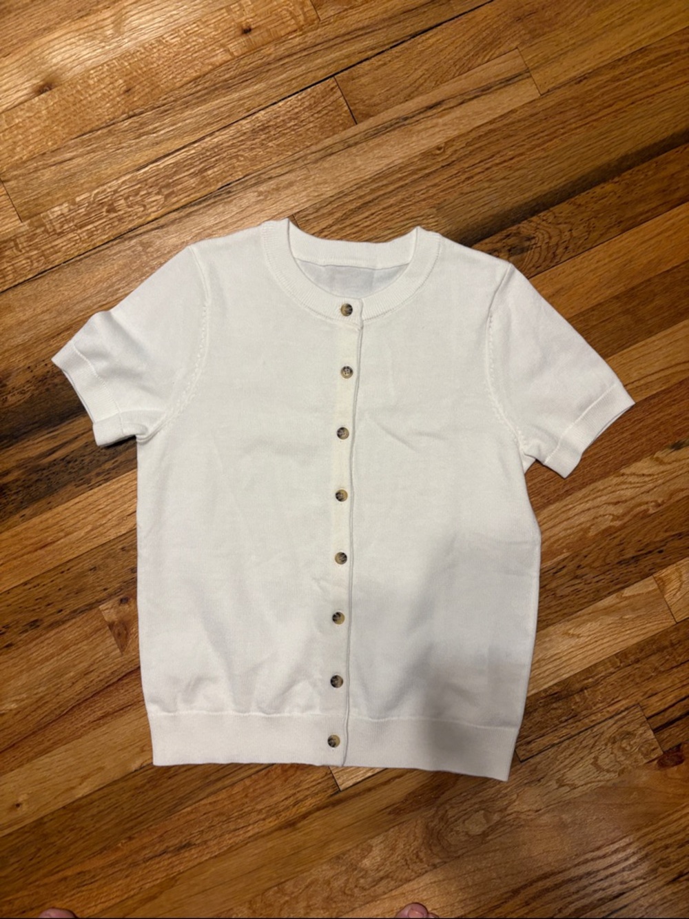 Classic White Short-Sleeve Button-Front Knit Top - woman’s